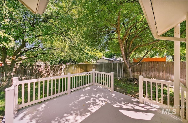 900 N Player Ave, Eagle, ID 83616 - fenced backyard with a patio area