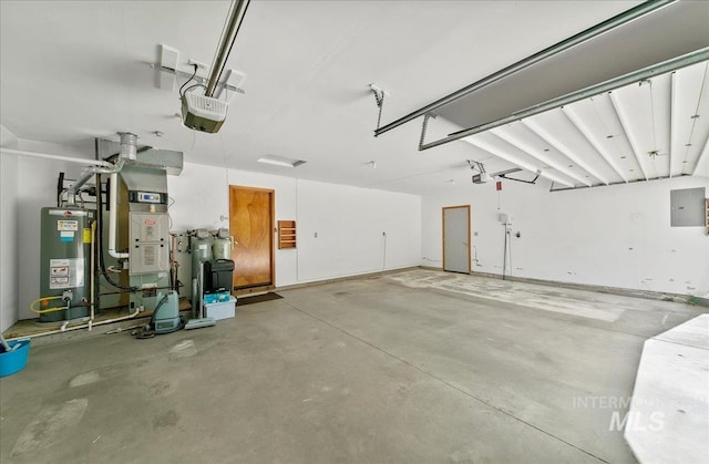 900 N Player Ave, Eagle, ID 83616 - garage with water heater, heating unit, a garage door opener, and electric panel