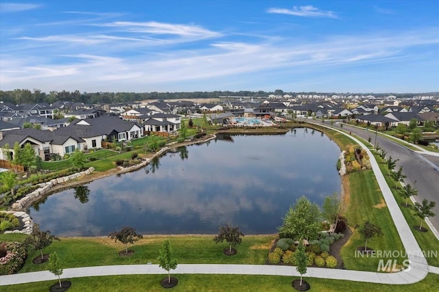 aerial view with a water view and a residential view