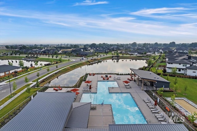 aerial view featuring a water view and a residential view