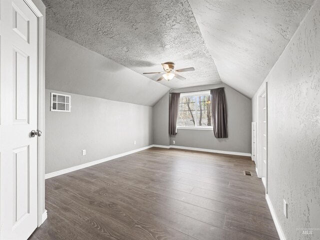 3500 W Overland, Boise, ID 83705 - bonus room featuring dark wood-style floors, a textured ceiling, and visible vents