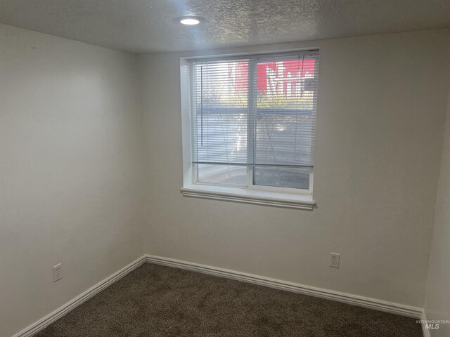 3500 W Overland, Boise, ID 83705 - carpeted empty room featuring baseboards and a textured ceiling