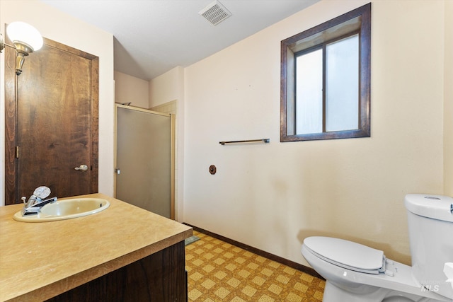 full bathroom featuring visible vents, a shower stall, baseboards, toilet, and tile patterned floors