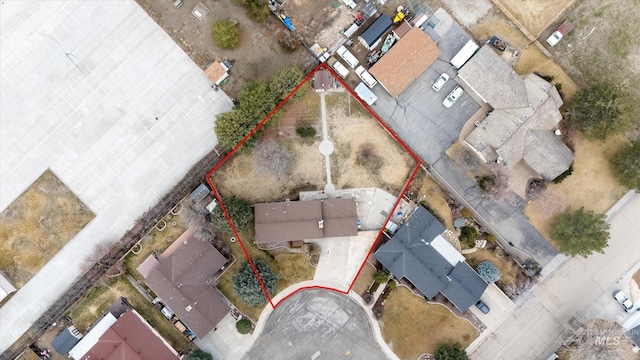 birds eye view of property with a residential view