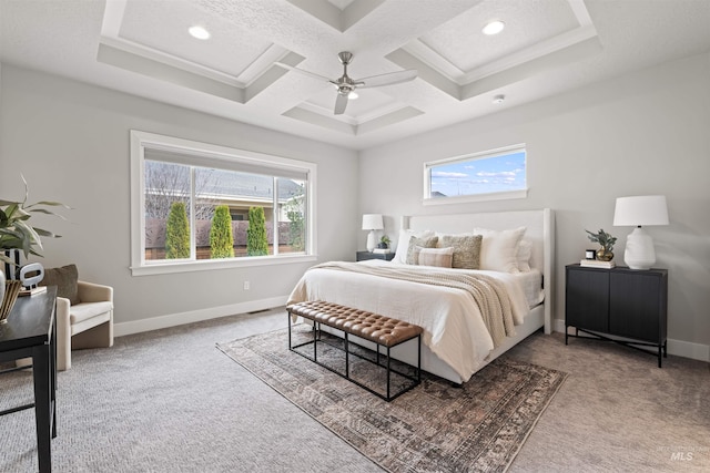 carpeted bedroom with multiple windows, baseboards, and coffered ceiling