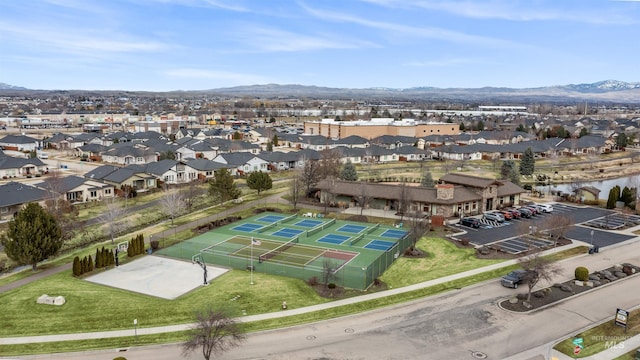 birds eye view of property featuring a residential view and a mountain view