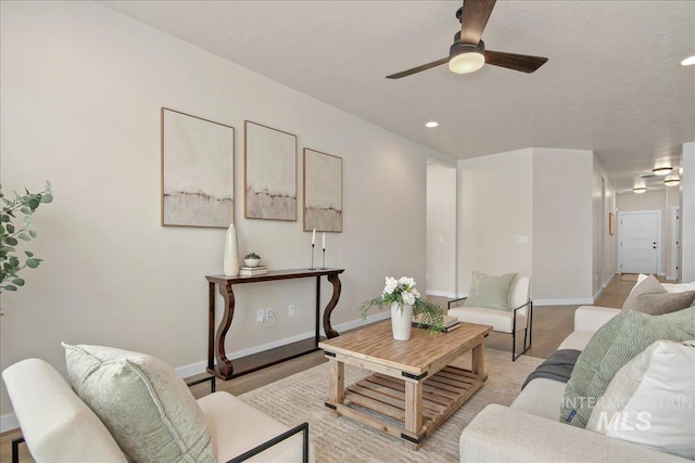 321 N Bay Haven Ave, Kuna, ID 83634 - living area with a ceiling fan, baseboards, recessed lighting, and a textured ceiling