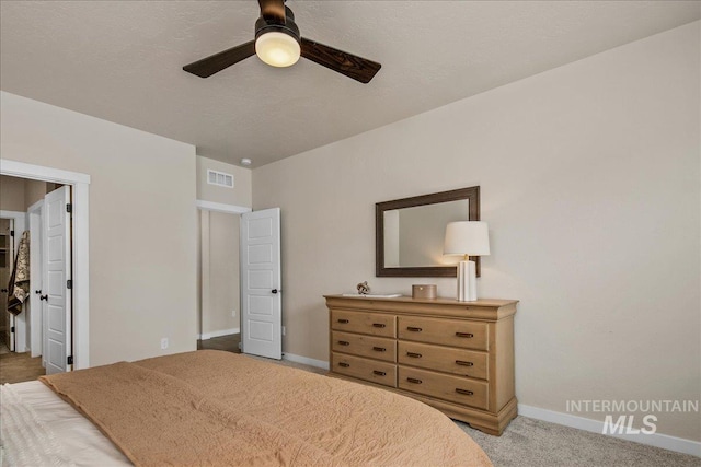 321 N Bay Haven Ave, Kuna, ID 83634 - bedroom with baseboards, light colored carpet, and a ceiling fan