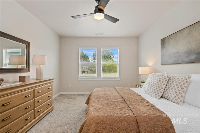 321 N Bay Haven Ave, Kuna, ID 83634 - bedroom with light carpet, baseboards, and ceiling fan