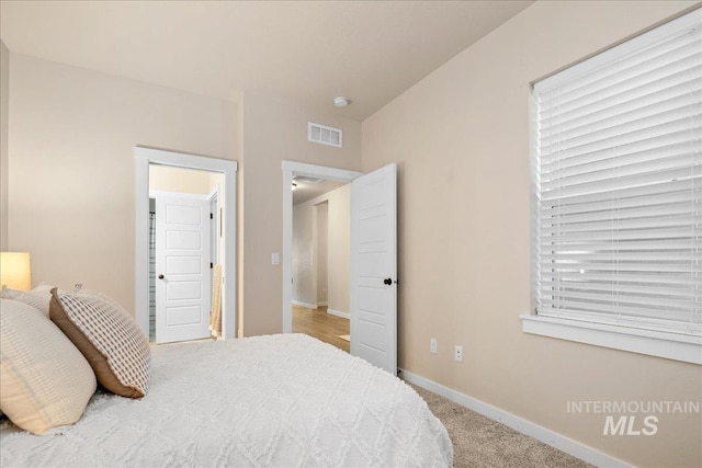 321 N Bay Haven Ave, Kuna, ID 83634 - bedroom with baseboards and light carpet