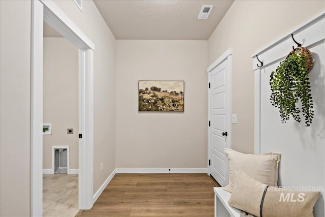 321 N Bay Haven Ave, Kuna, ID 83634 - mudroom featuring wood finished floors and baseboards