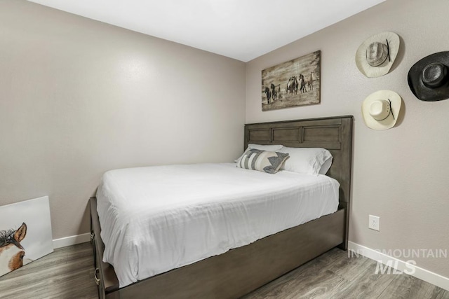 111 Main, Hagerman, ID 83332 - bedroom with wood finished floors and baseboards