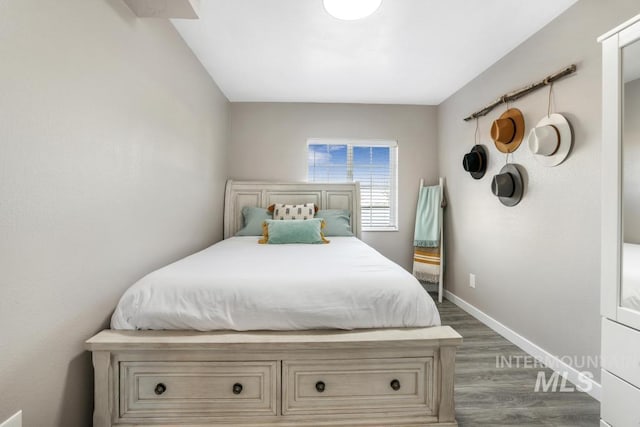 111 Main, Hagerman, ID 83332 - bedroom with dark wood-type flooring and baseboards