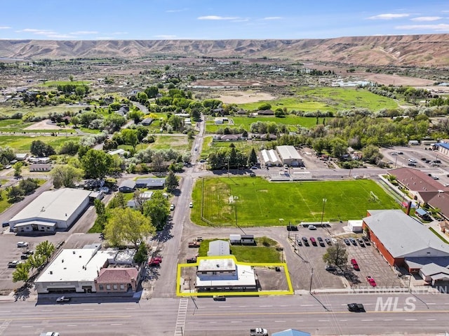 111 Main, Hagerman, ID 83332 - aerial overview of property's location featuring mountains and property parcel outlined