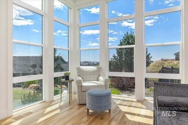 2391 S Trapper Pl, Boise, ID 83716 - sunroom with visible vents, a wealth of natural light, and wood finished floors