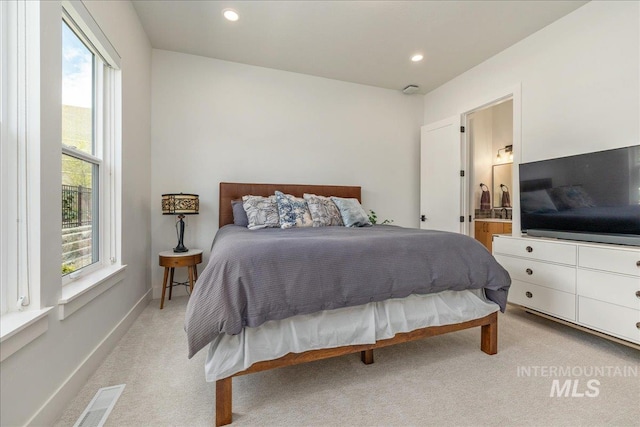 2391 S Trapper Pl, Boise, ID 83716 - bedroom with recessed lighting, light colored carpet, multiple windows, and visible vents