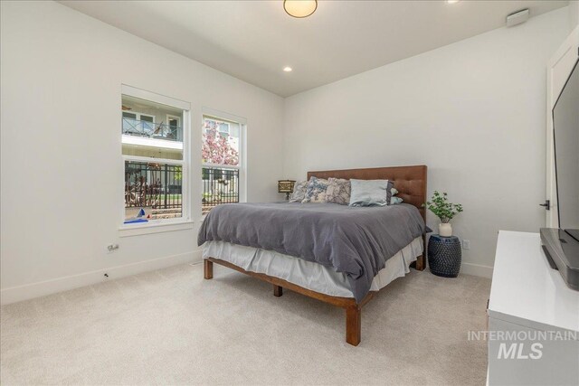 2391 S Trapper Pl, Boise, ID 83716 - bedroom with light colored carpet, recessed lighting, and baseboards