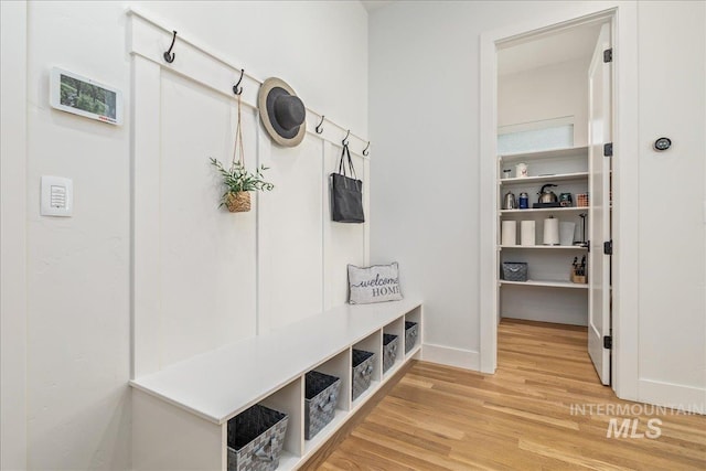2391 S Trapper Pl, Boise, ID 83716 - mudroom featuring light wood-style floors and baseboards