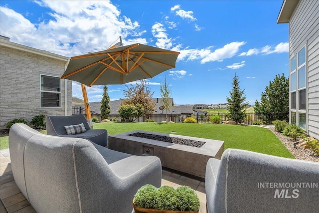 2391 S Trapper Pl, Boise, ID 83716 - view of patio featuring a fenced backyard and an outdoor living space with a fire pit