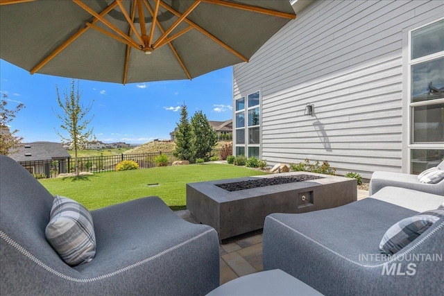 2391 S Trapper Pl, Boise, ID 83716 - view of patio featuring a fenced backyard and an outdoor fire pit