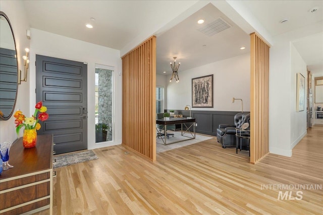 2391 S Trapper Pl, Boise, ID 83716 - foyer entrance featuring baseboards, recessed lighting, wood finished floors, and visible vents