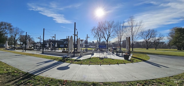 surrounding community featuring a lawn