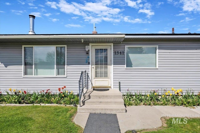 1341 N Fillmore, Jerome, ID 83338 - property entrance with a lawn
