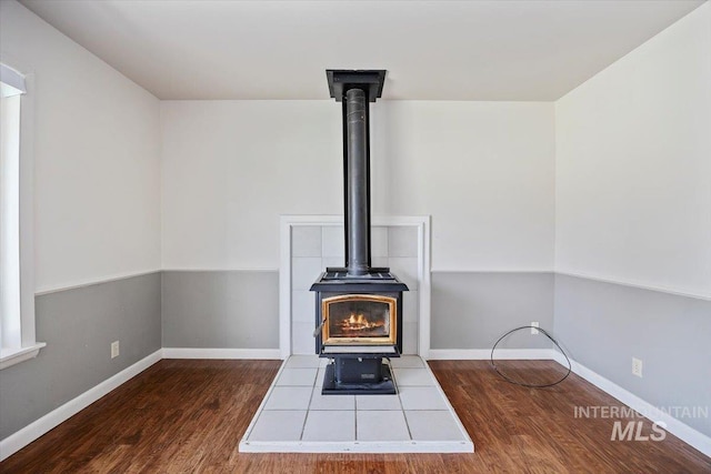 1341 N Fillmore, Jerome, ID 83338 - detailed view of a wood stove and wood finished floors