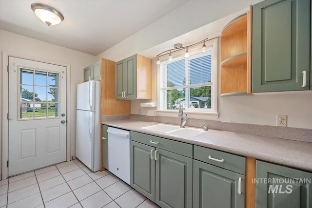 1341 N Fillmore, Jerome, ID 83338 - kitchen featuring white appliances, light countertops, light tile patterned flooring, and green cabinets