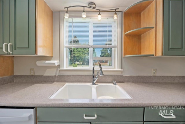 1341 N Fillmore, Jerome, ID 83338 - kitchen featuring green cabinetry, open shelves, light countertops, and dishwashing machine