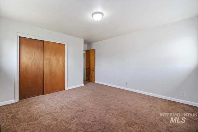 1341 N Fillmore, Jerome, ID 83338 - unfurnished bedroom featuring a closet and carpet floors
