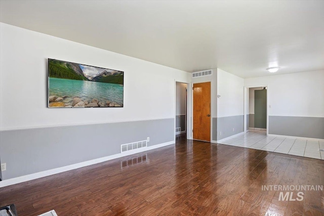 1341 N Fillmore, Jerome, ID 83338 - empty room with wood finished floors and baseboards