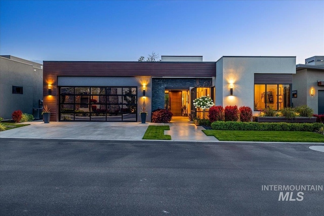 1865 E Lone Shore Ln, Eagle, ID 83616 - view of front facade with an attached garage and driveway