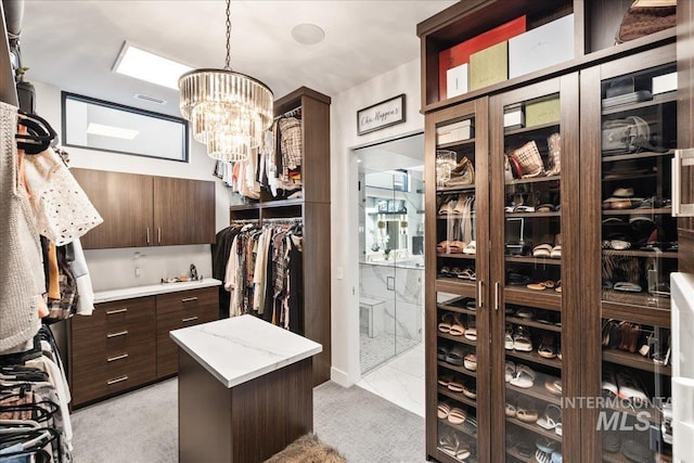 1865 E Lone Shore Ln, Eagle, ID 83616 - walk in closet with an inviting chandelier and visible vents