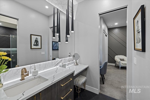 1865 E Lone Shore Ln, Eagle, ID 83616 - bathroom featuring recessed lighting, baseboards, and vanity