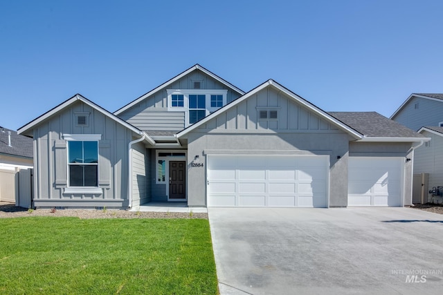 view of front facade with board and batten siding, a garage, and driveway