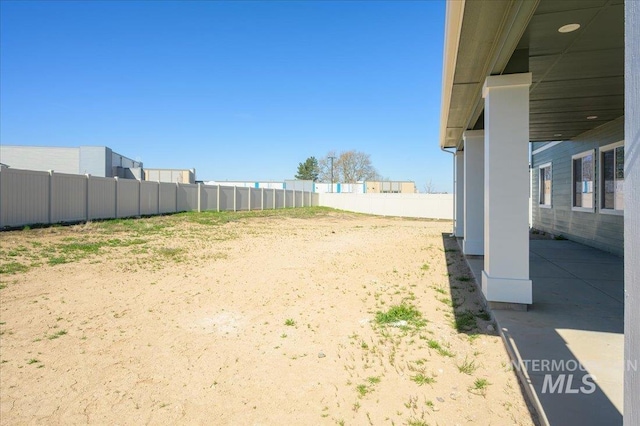view of yard with fence