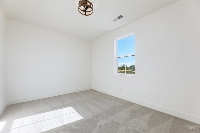 12507 S Lenora Pl, Nampa, ID 83686 - empty room with baseboards, light colored carpet, and visible vents