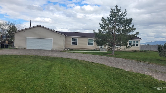 1455 S 2190 E, Malta, ID 83342 - ranch-style home with crawl space, gravel driveway, a front lawn, and a garage