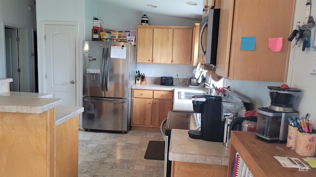 1455 S 2190 E, Malta, ID 83342 - kitchen with stainless steel appliances, a sink, light countertops, and lofted ceiling