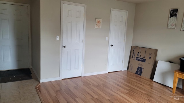 1455 S 2190 E, Malta, ID 83342 - unfurnished bedroom featuring baseboards and wood finished floors