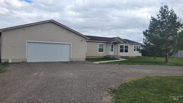 1455 S 2190 E, Malta, ID 83342 - ranch-style house featuring driveway, a garage, and a front yard