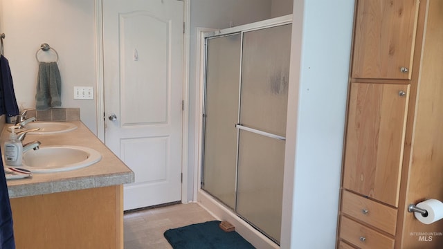 1455 S 2190 E, Malta, ID 83342 - bathroom featuring a stall shower and double vanity