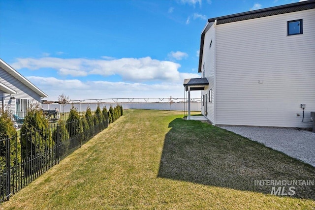 view of yard featuring fence