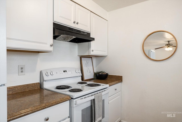 kitchen featuring under cabinet range hood, white cabinets, dark countertops, and white electric range oven