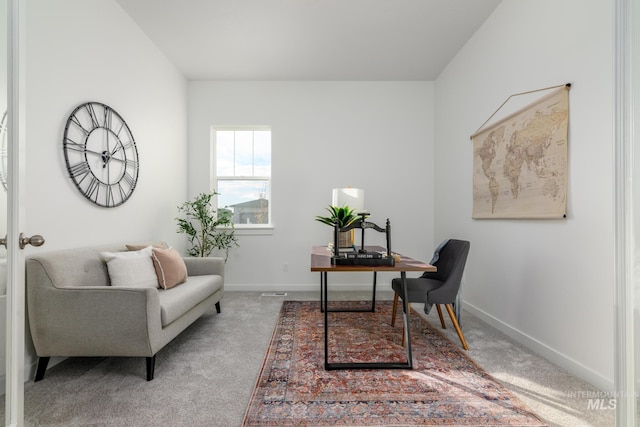 office with carpet and baseboards