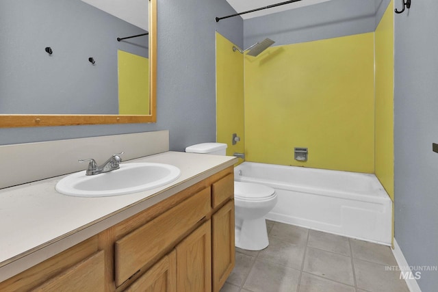 full bathroom featuring tile patterned floors, toilet,  shower combination, and vanity