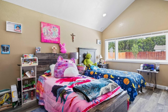 726 Wyoming St, Gooding, ID 83330 - bedroom with lofted ceiling and wood finished floors