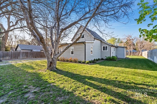 exterior space featuring a fenced backyard