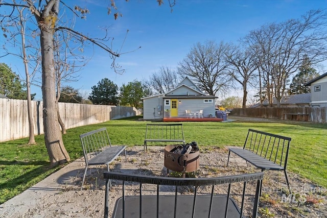 view of yard featuring a fenced backyard and a deck
